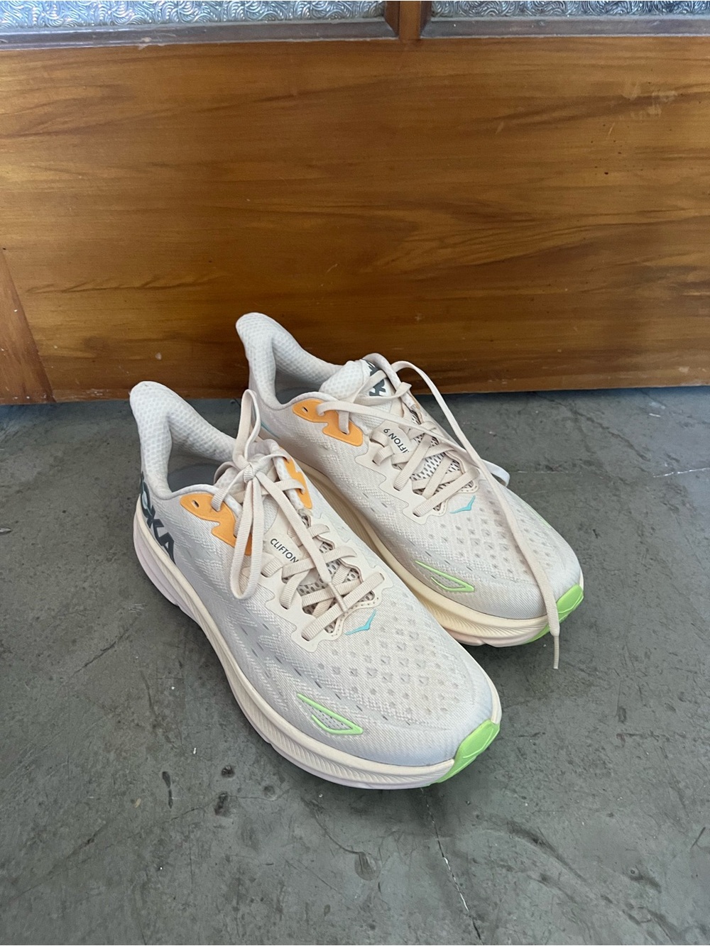 Hoka Running Sneakers in Cream with Lime and Peach Accents